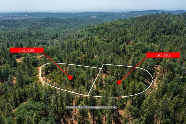 a view of a fence and a floor to ceiling window