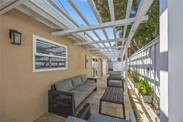 a view of living room filled with furniture