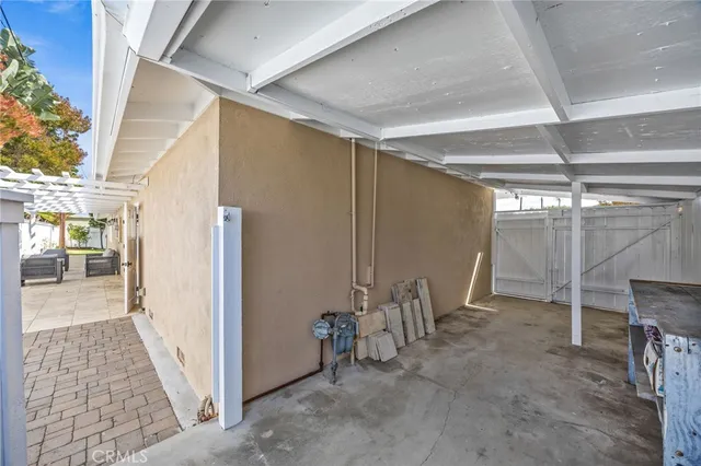 a view of a hallway with wooden shelves