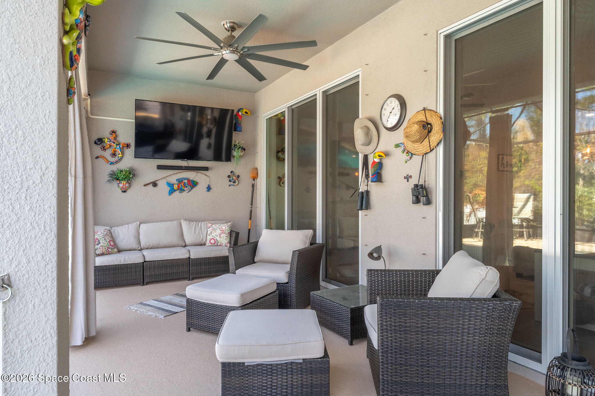 3470 Breezy Point Lane Cocoa, FL 32926 - Photo 33 of 69 a living room with furniture and a flat screen tv