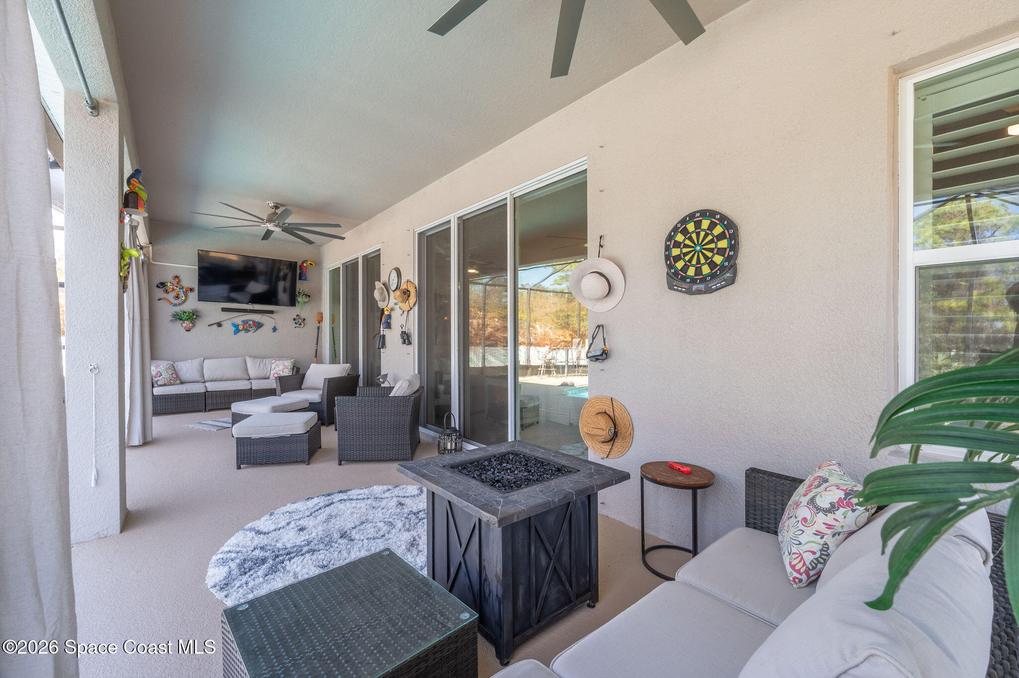 3470 Breezy Point Lane Cocoa, FL 32926 - Photo 34 of 69 a bed room with a bed and a couch