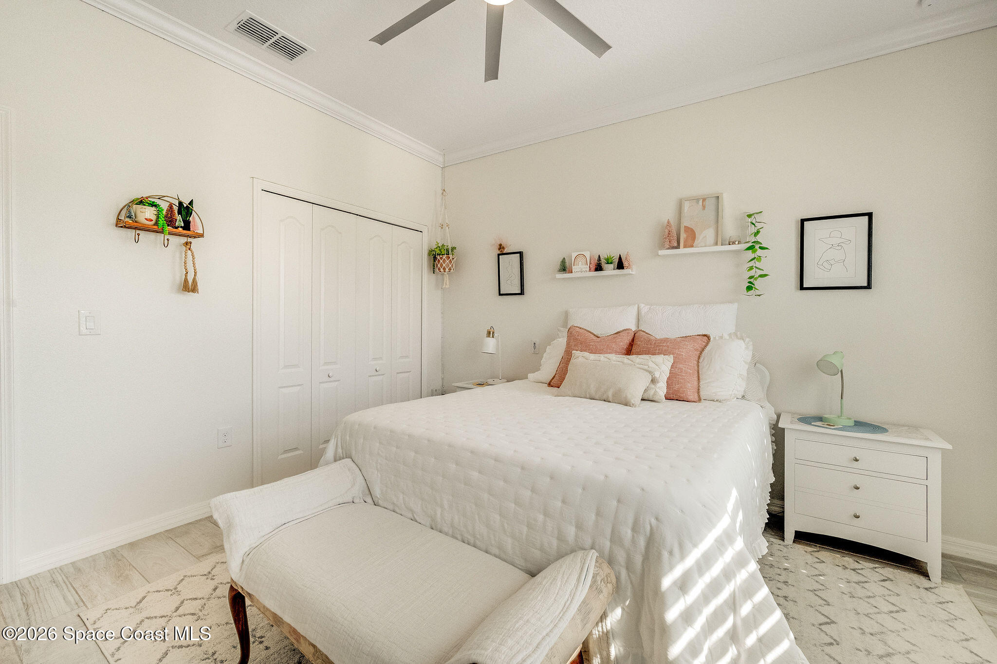 3470 Breezy Point Lane Cocoa, FL 32926 - Photo 47 of 69 a bed room with a bed and a couch