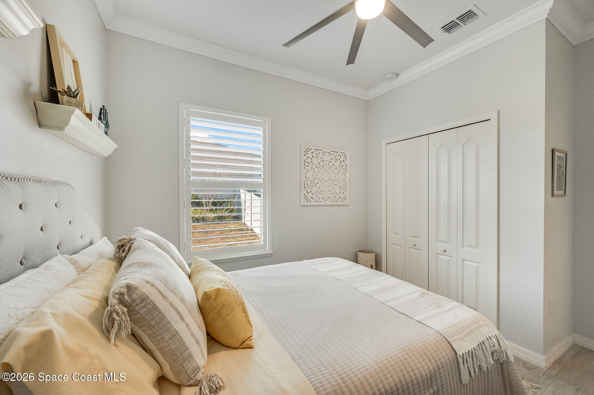 3470 Breezy Point Lane Cocoa, FL 32926 - Photo 49 of 69 a bedroom with a bed and a flat tv screen