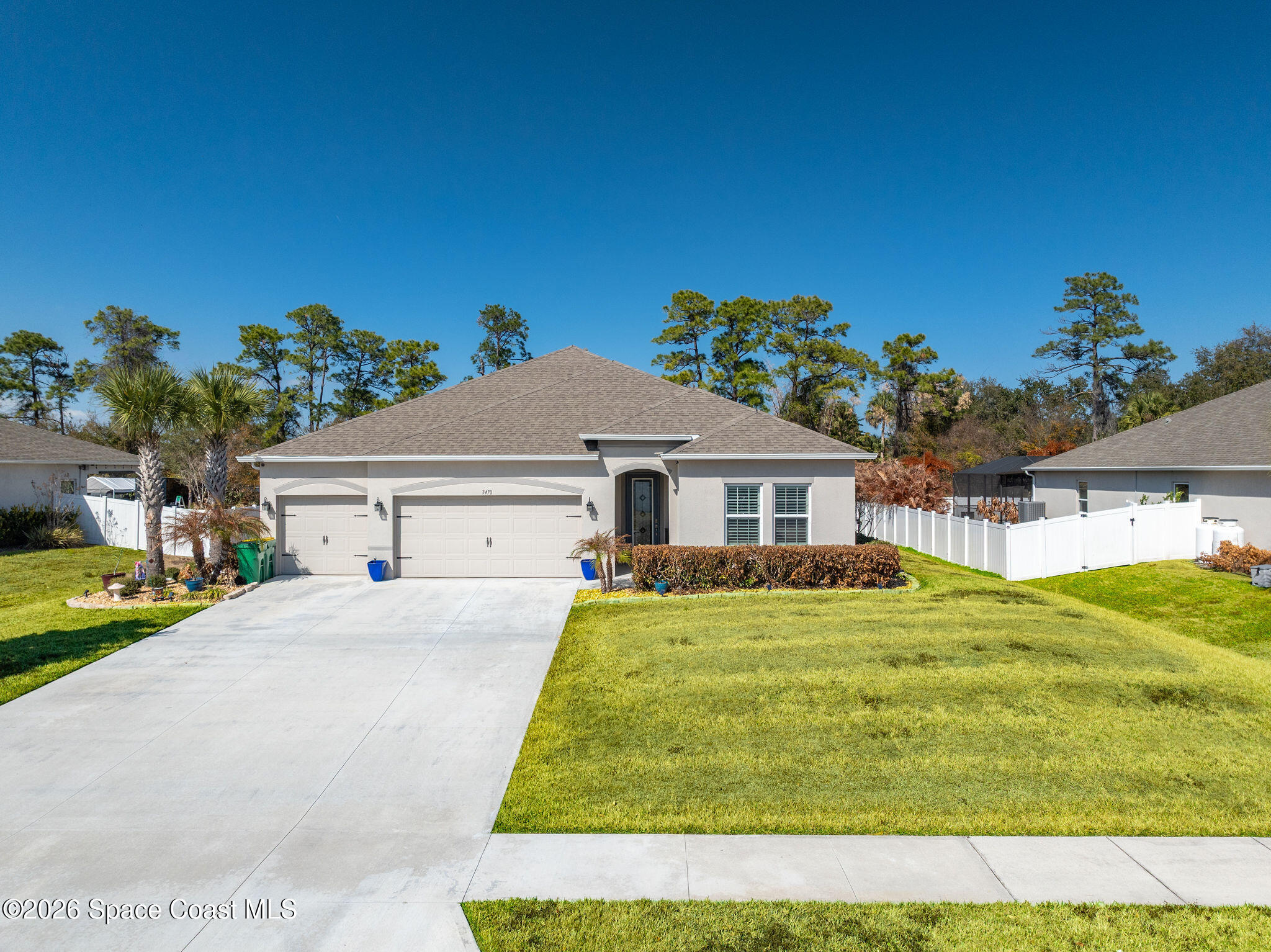 3470 Breezy Point Lane Cocoa, FL 32926 - Photo 60 of 69 a house view with a garden space