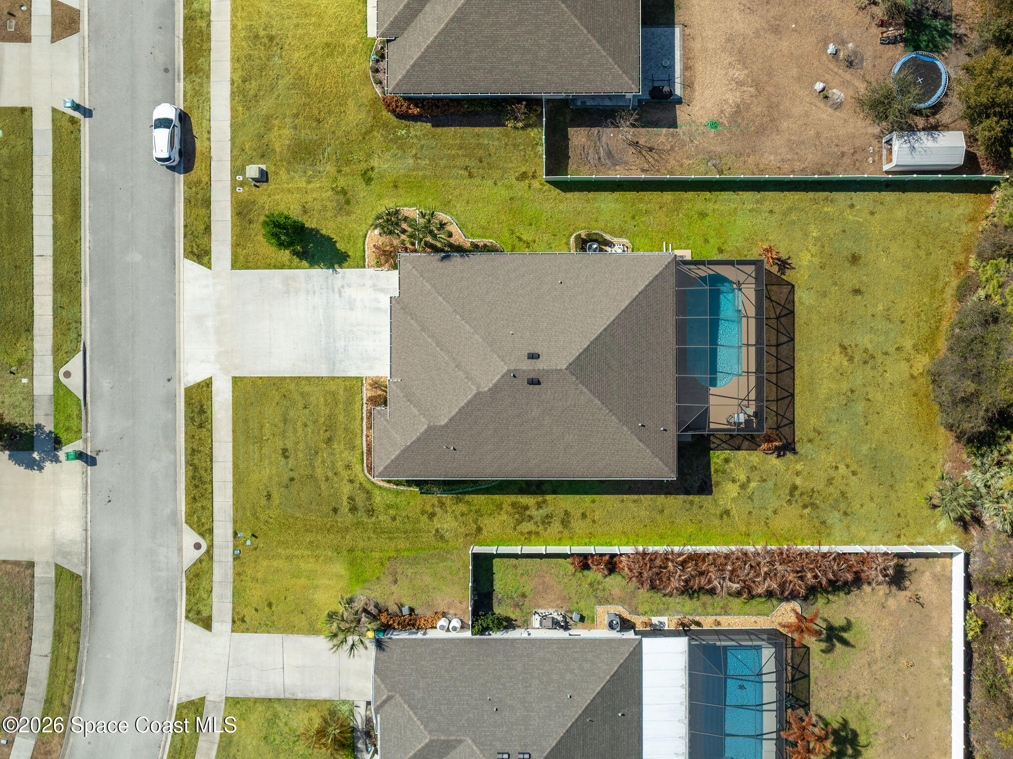 3470 Breezy Point Lane Cocoa, FL 32926 - Photo 64 of 69 an aerial view of a house with swimming pool