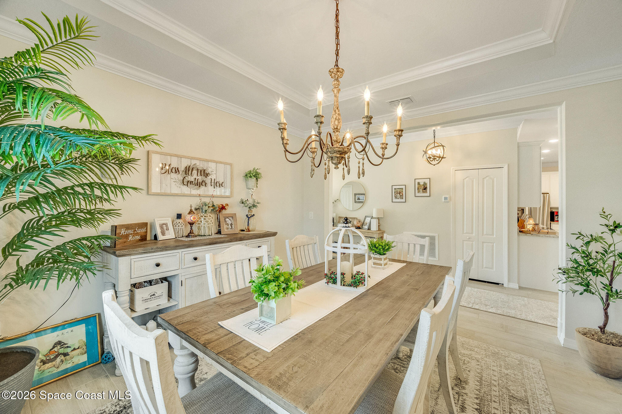 3470 Breezy Point Lane Cocoa, FL 32926 - Photo 7 of 69 a view of a dining room with furniture and chandelier