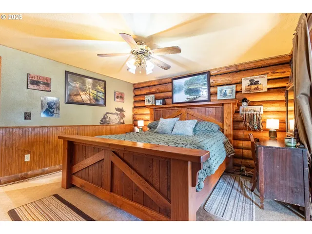 a bedroom with a bed and a cabinets