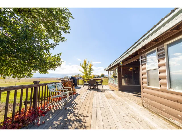 a patio with table and chairs