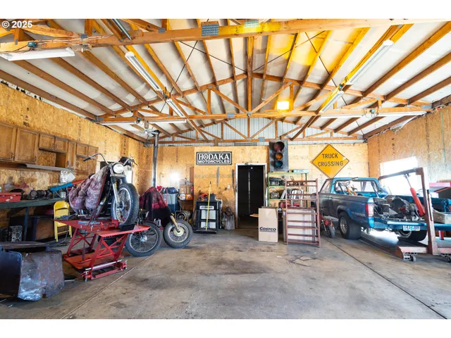 a view of storage and utility room with a sink