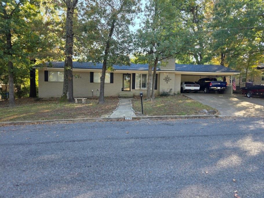 505 Colonial Drive Athens, TX 75751 - Photo 1 of 33 a view of a car park in front of a house
