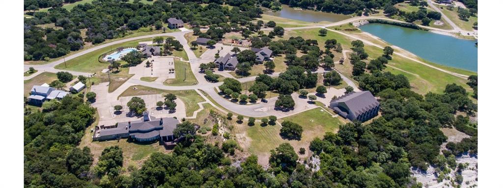 12074 Songbird Road Whitney, TX 76692 - Photo 4 of 16 an aerial view of residential house with outdoor space and swimming pool