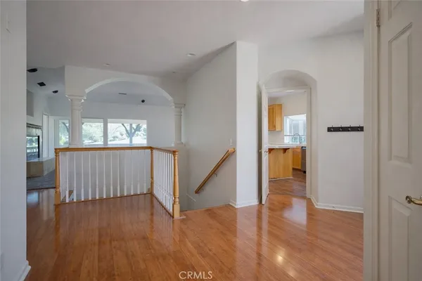 a view of entryway with wooden floor