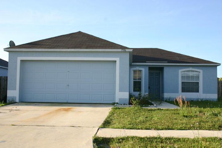 7356 Gum Tree Road Jacksonville, FL 32244 - Photo 1 of 1 a front view of house with yard