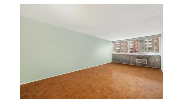 a view of a room with a window