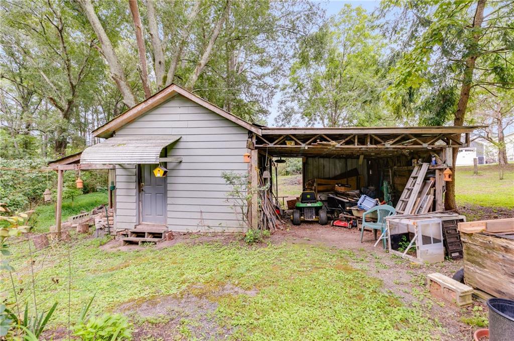 4661 Fowler Street Acworth, GA 30101 - Photo 12 of 16 a view of outdoor space and deck
