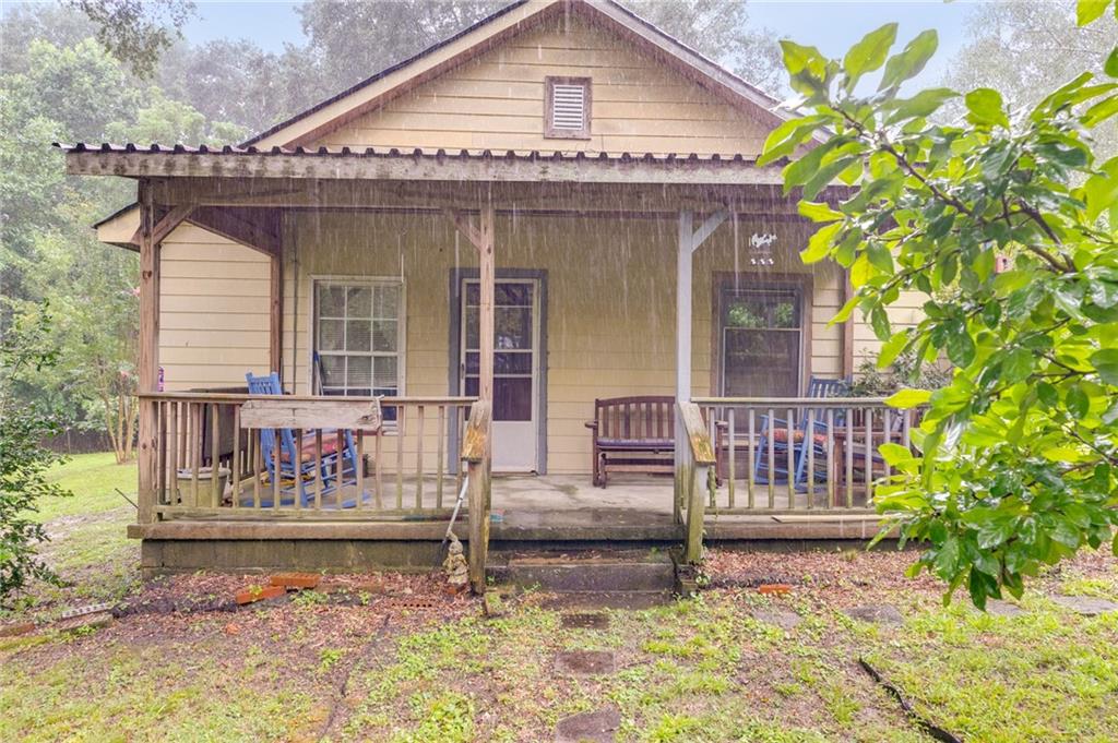 4661 Fowler Street Acworth, GA 30101 - Photo 13 of 16 a front view of a house with garden