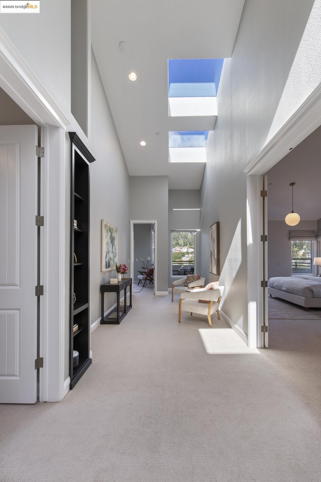 205 Sheridan Road Oakland, CA 94618 - Photo 1 of 1 a living room with furniture and a chandelier