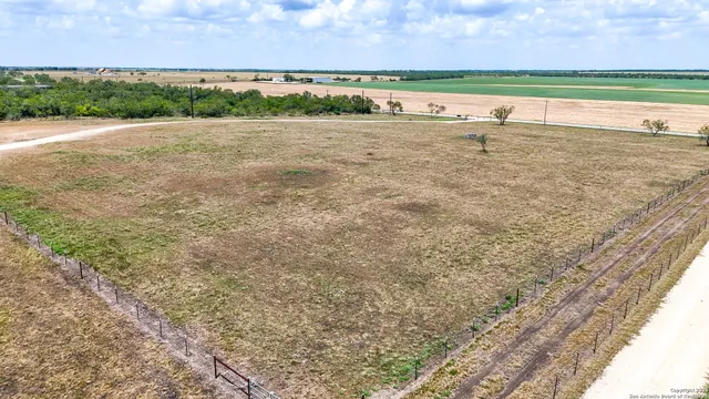 a view of swimming pool with a yard