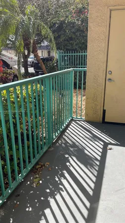 a kitchen with a stove a sink and a microwave