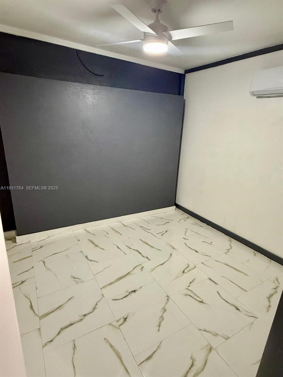 10357 Southwest 174th Terrace, Unit 1 Miami, FL 33157 - Photo 7 of 7 a view of a big room