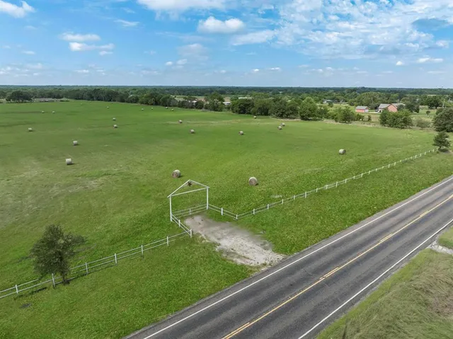 a view of a golf course with a lake