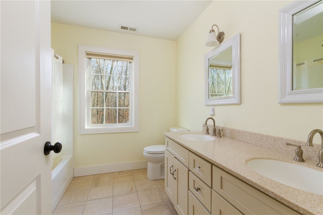 750 Gilbert Stuart Road North Kingstown, RI 02874 - Photo 36 of 44 Second-floor bathroom with tub.