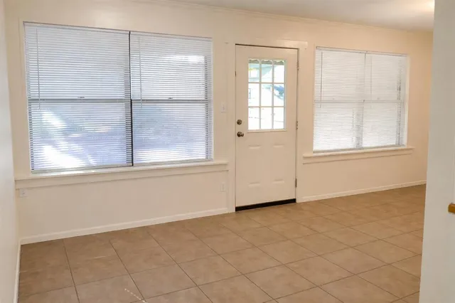 an empty room with windows