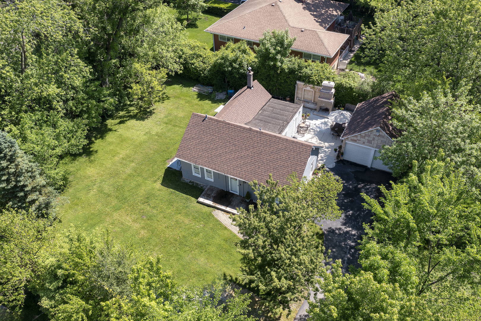 2015 Greenview Road Northbrook, IL 60062 - Photo 2 of 11 an aerial view of a house with garden space and street view