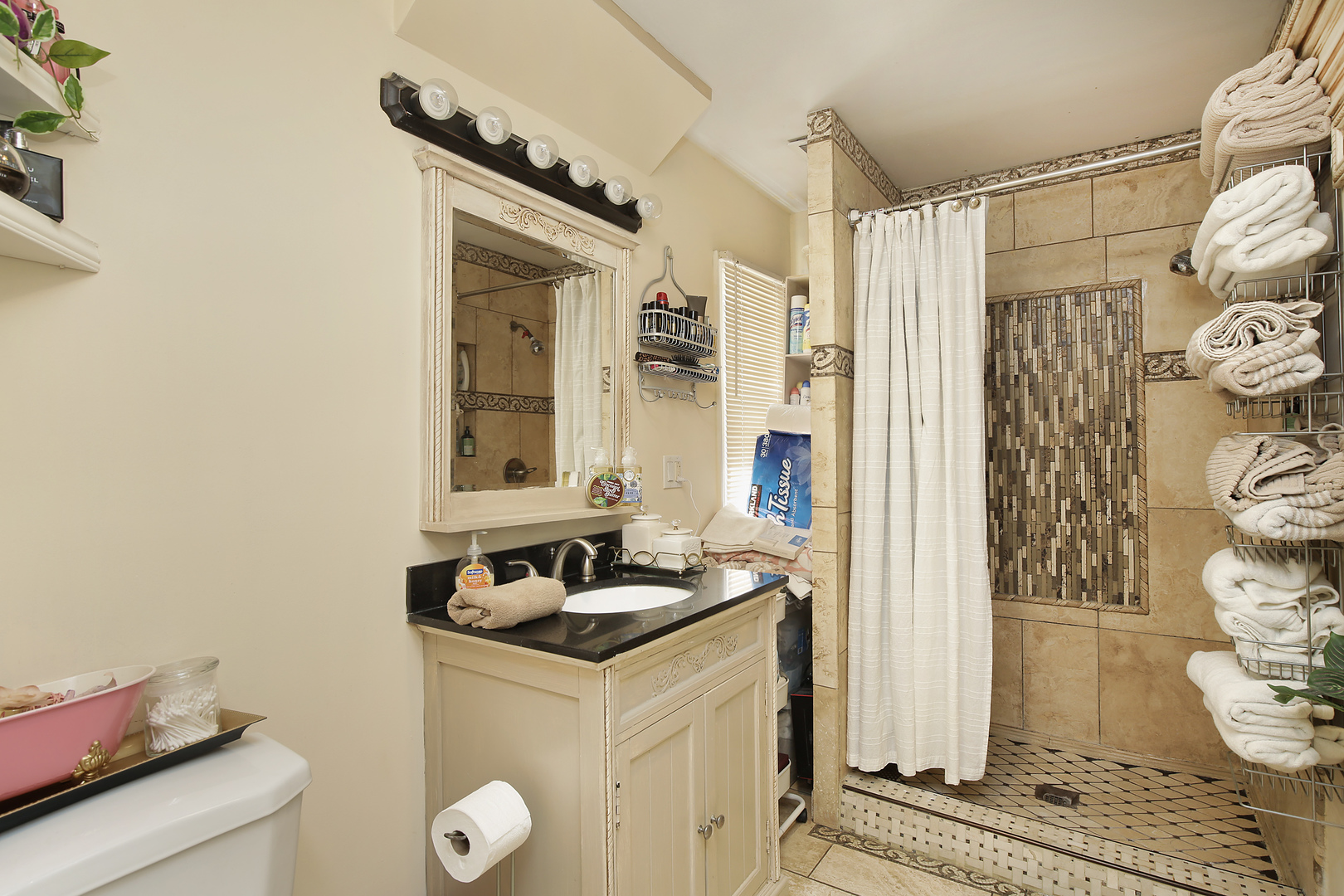 2015 Greenview Road Northbrook, IL 60062 - Photo 8 of 11 a bathroom with a sink and a mirror