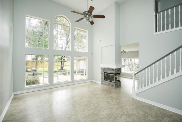 16222 Morningbrook Drive Spring, TX 77379 - Photo 16 of 44 wooden floor in an empty room with a window