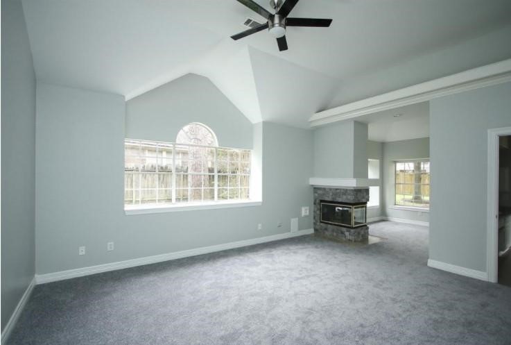 16222 Morningbrook Drive Spring, TX 77379 - Photo 19 of 44 a view of a livingroom with a piano and a window