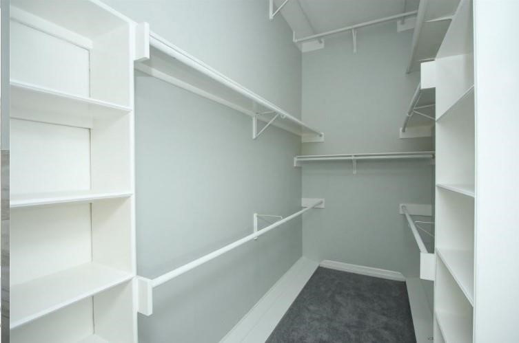 16222 Morningbrook Drive Spring, TX 77379 - Photo 24 of 44 a view of an empty walk in closet