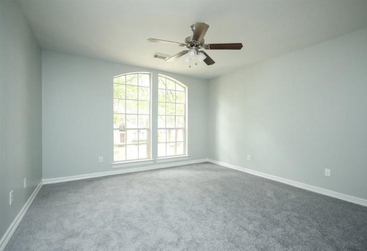 16222 Morningbrook Drive Spring, TX 77379 - Photo 29 of 44 an empty room with a window