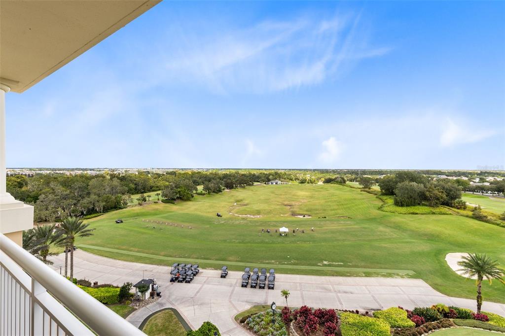 7593 Gathering Drive, Unit 501 Reunion, FL 34747 - Photo 26 of 38 a view of a city and an ocean