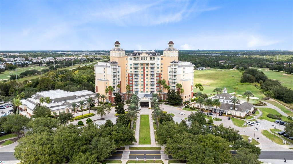 7593 Gathering Drive, Unit 501 Reunion, FL 34747 - Photo 30 of 38 a city view with tall buildings