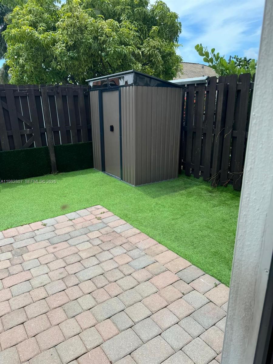 4217 Southwest 164th Court Miami, FL 33185 - Photo 10 of 15 a view of a backyard