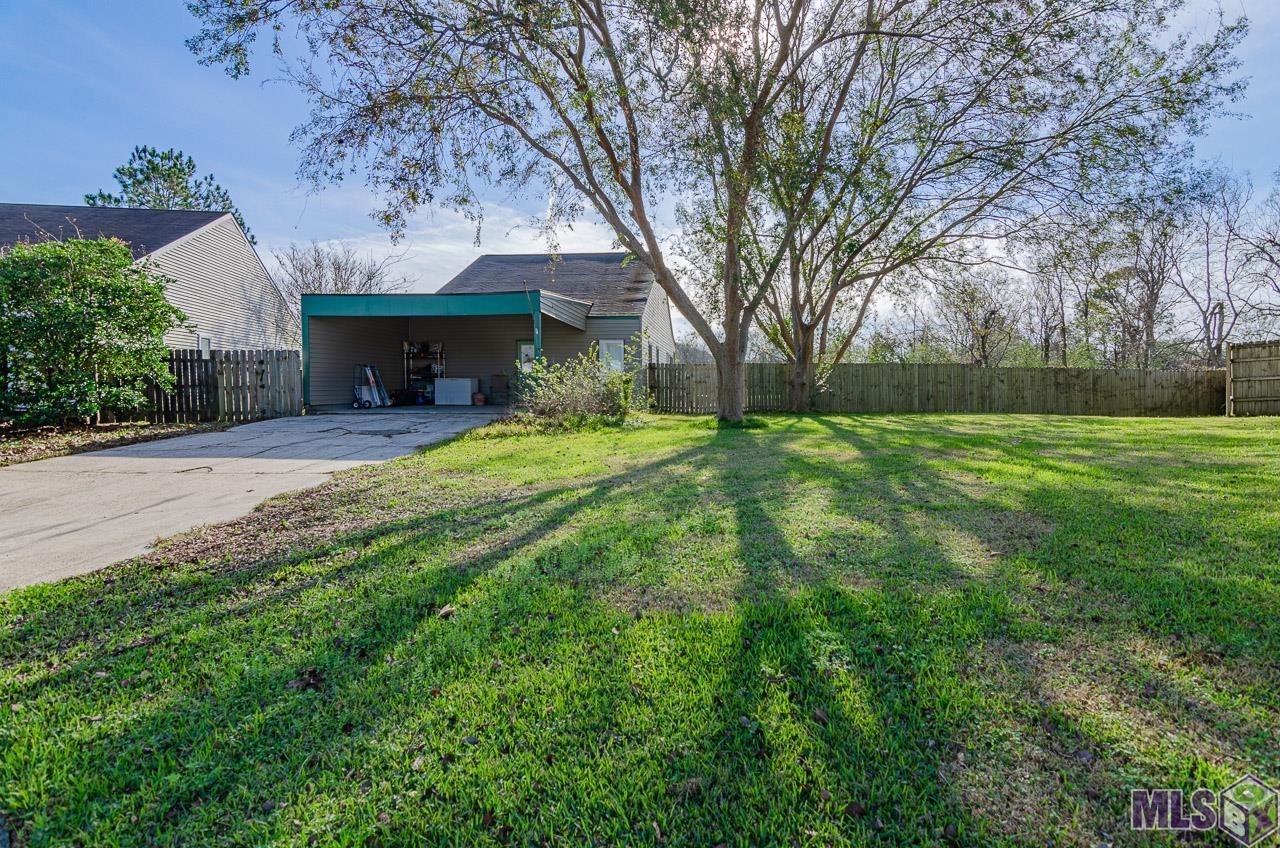 15464 Point Breton Avenue Baton Rouge, LA 70817 - Photo 20 of 25 Front of Home with Carport