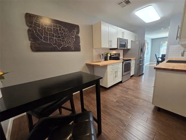 a view of kitchen and microwave