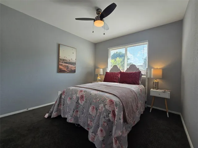 a view of backyard with green space