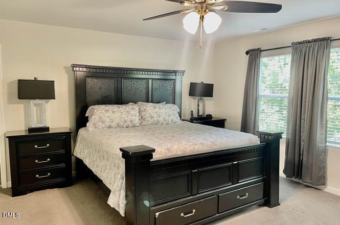 1807 Wrenn Road Durham, NC 27703 - Photo 40 of 43 a bedroom with a bed and a tv