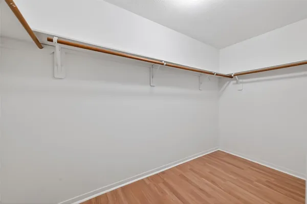 a view of a room with shelf on the wall