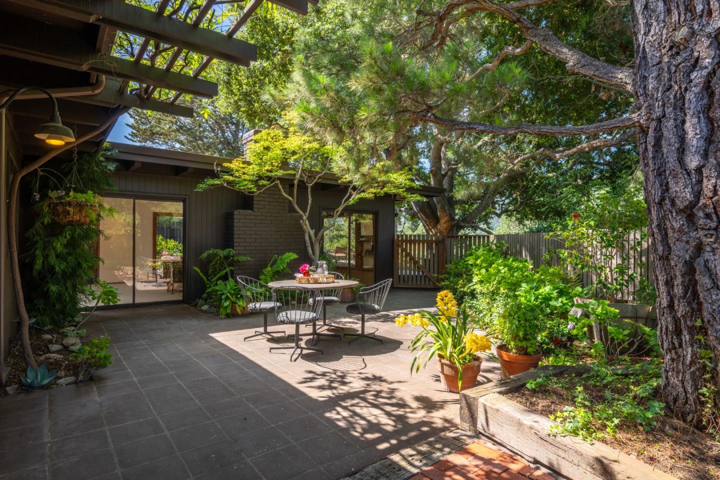 46 Middle Canyon Road Carmel Valley, CA 93924 - Photo 54 of 74 a view of a chairs and table in the patio