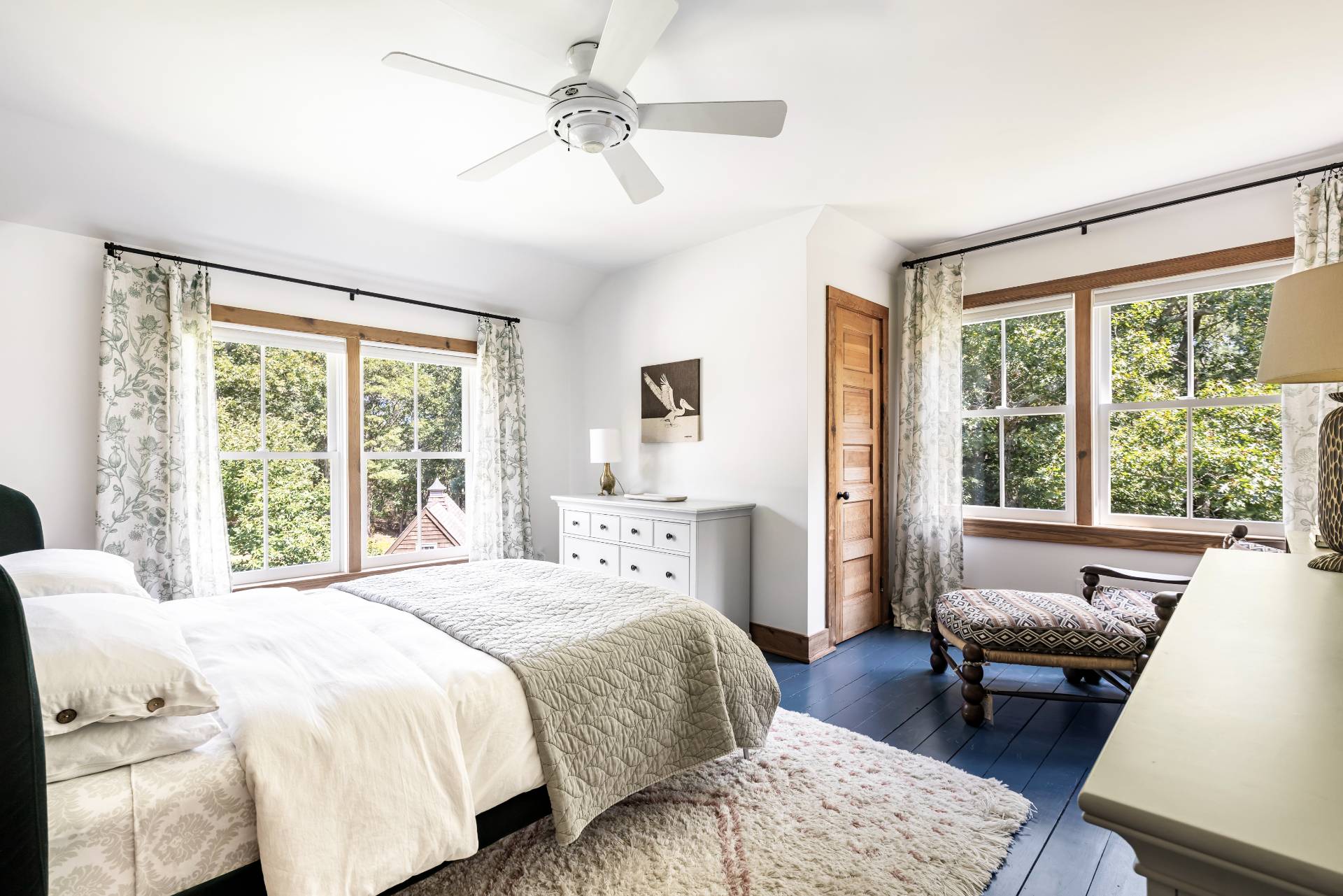311 Town Line Road Wainscott, NY 11963 - Photo 12 of 39 a spacious bedroom with a large bed and a balcony