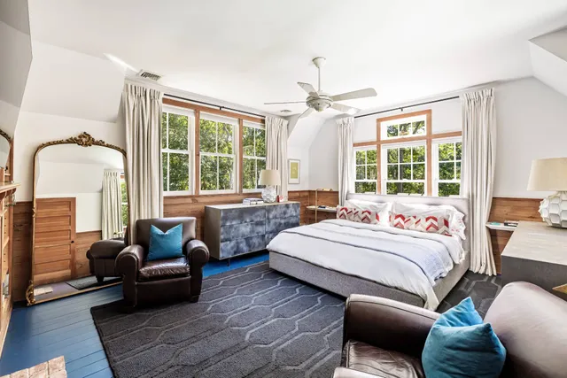 a view of a house with swimming pool and yard