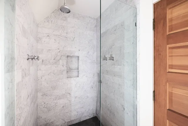 a view of a house with swimming pool and a yard