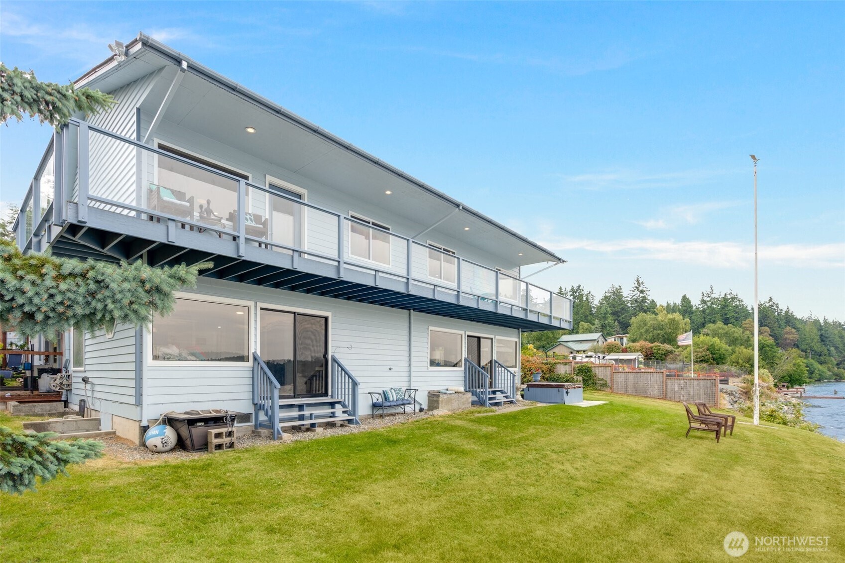 5341 South Bercot Road Freeland, WA 98249 - Photo 36 of 37 a view of a house with backyard and porch
