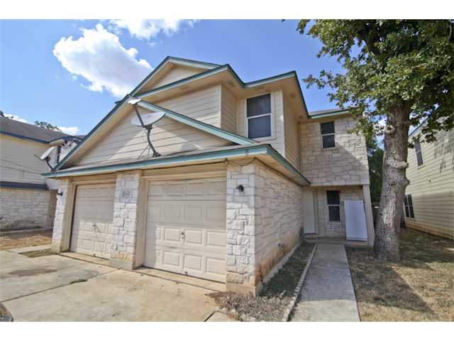 2402 Riddle Road Austin, TX 78748 - Photo 1 of 1 a view of a house with a yard