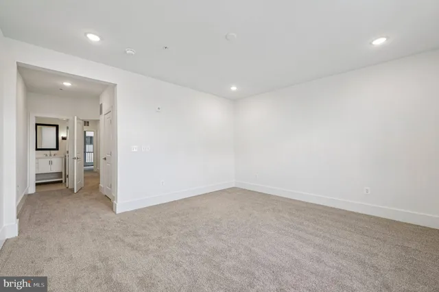 an empty room with a bathroom