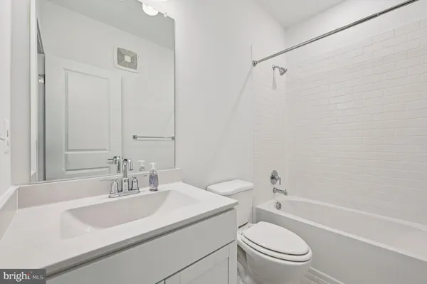 an empty room with a empty space and a window