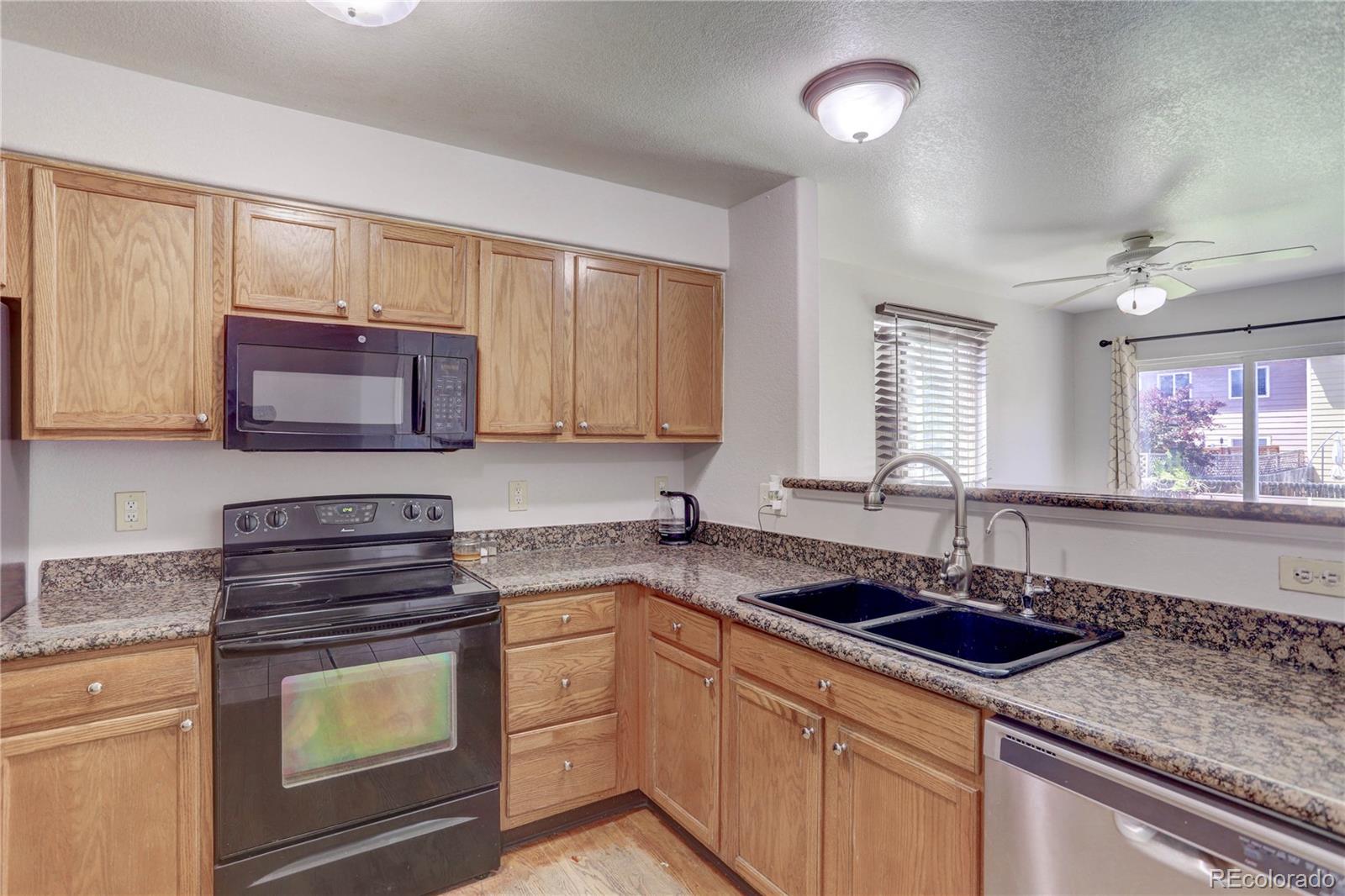 4585 Dillon Street Denver, CO 80239 - Photo 9 of 27